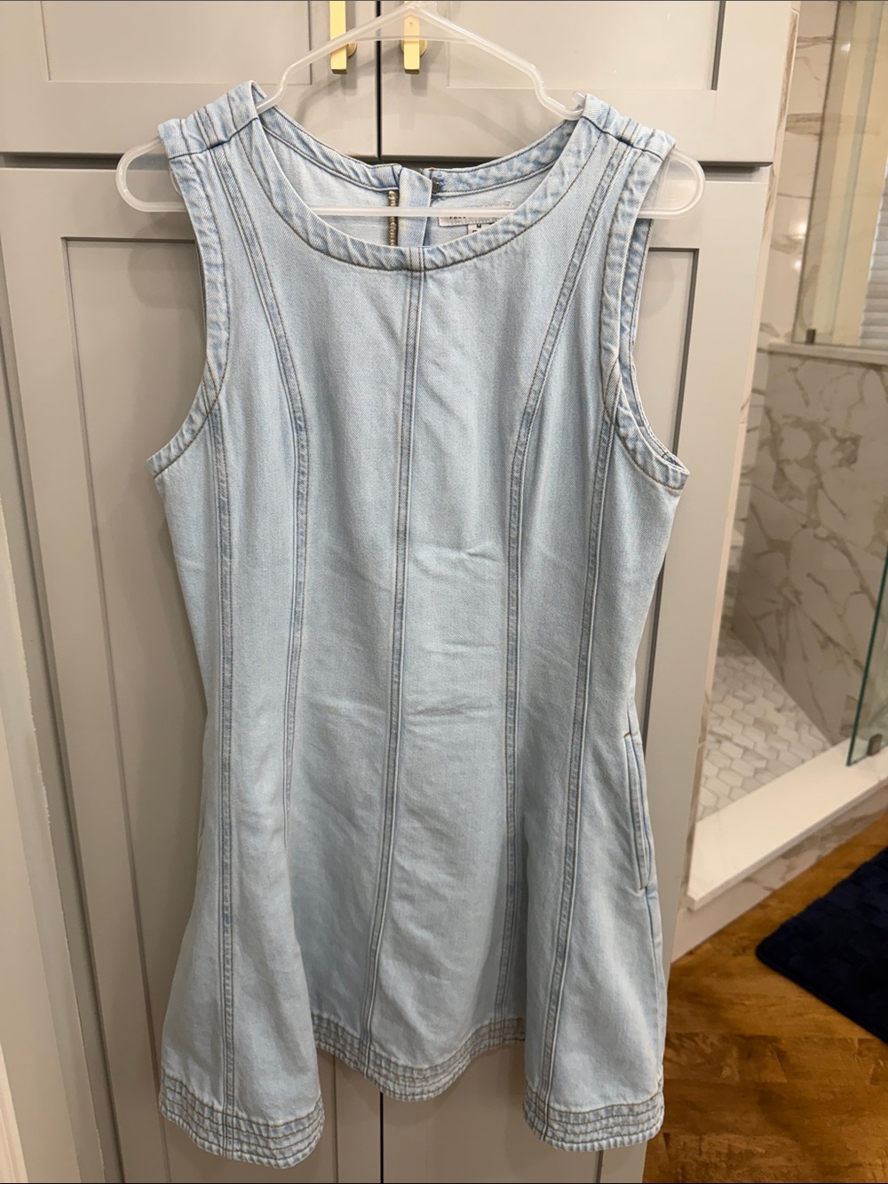 Sleeveless Light Wash Denim Mini Dress in Pale Blue